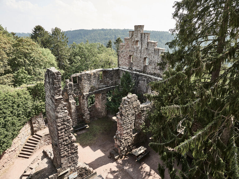 The Zavelstein castle ruins framed by the trees of the Black Forest.